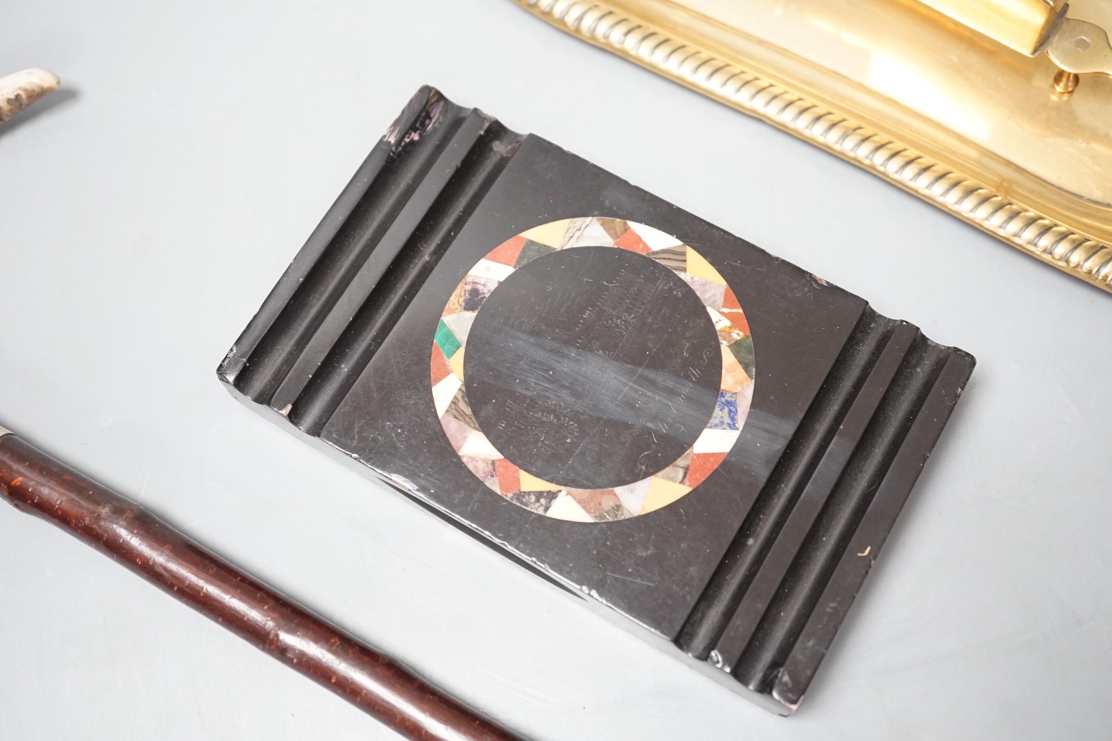 A pair of 19th century candle snuffers and tray, a hardstone paperweight and a crop